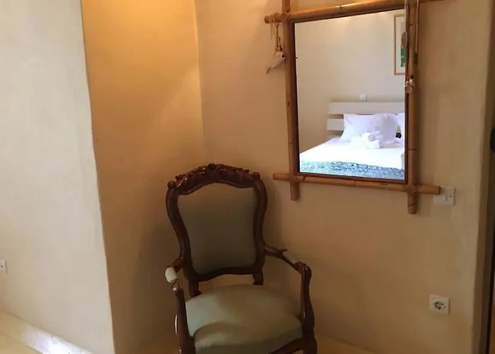 Andros -stone House With Shared Pool & Seaview בית נופש